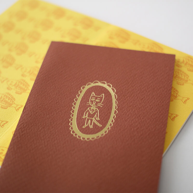 エッセイ『もものかんづめ』のカバーを外した表紙のノート